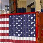 american_container_with_usa_flag_in_port-833x321